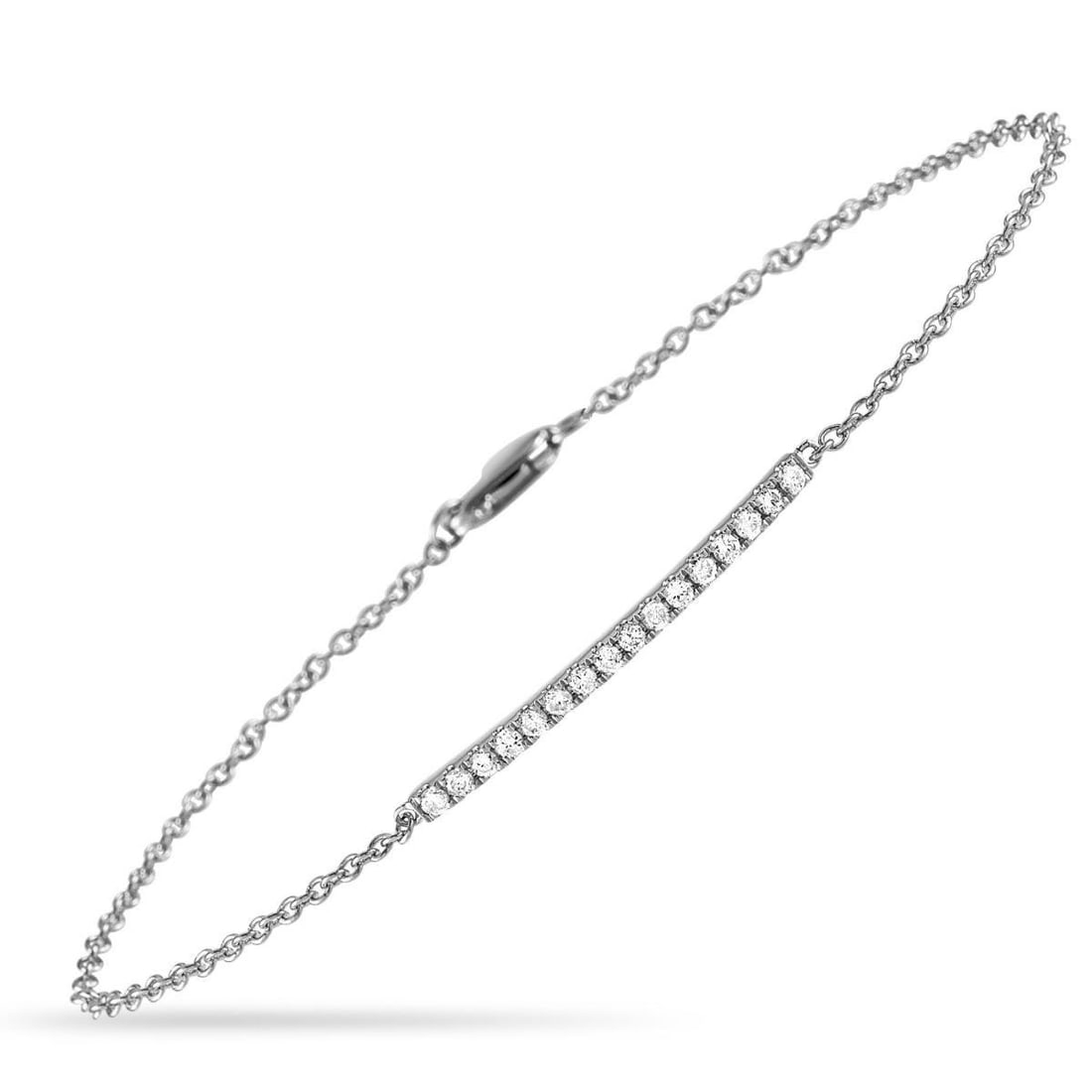 14K WHITE GOLD 0.25CT DIAMOND BRACELET: This bracelet is made of 14K white gold and embellished with diamonds that amount to 0.25 carats. The bracelet weighs 1.8 grams and measures 7 in length.Offered in brand new condition, this jewelr