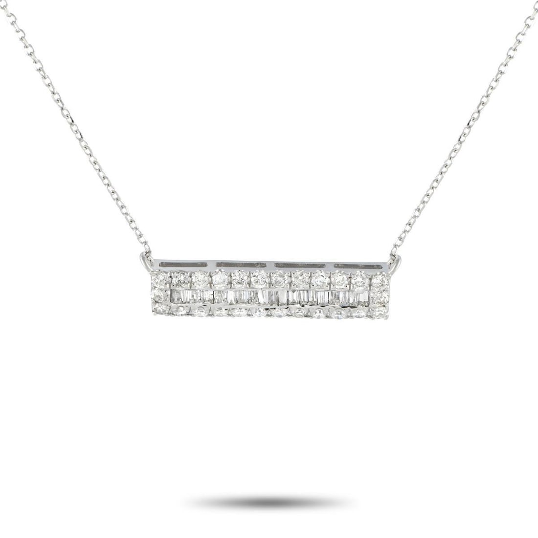 14K WHITE GOLD 0.80CT DIAMOND BAR NECKLACE: A diamond necklace that elevates any look. This piece features a 15-long chain holding a 0.25 by 0.95 rectangular pendant. The bar-shaped pendant has its center lined with vertically-set step-cut diam