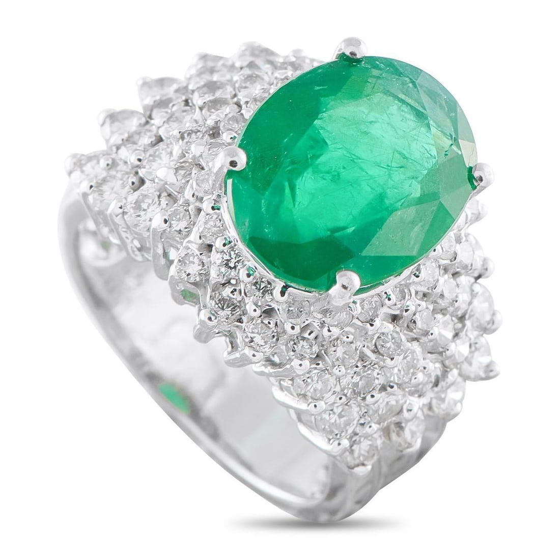 18K WHITE GOLD 1.75CT DIAMOND AND EMERALD RING: This exquisite ring is designed to catch the light from any angle. An array of sparkling Diamonds totaling 1.75 carats make it simply unforgettable. At the center, a 5.0 carat Emerald offers a stylish