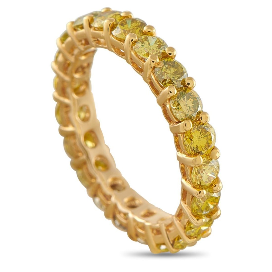 14K YELLOW GOLD 2.50CT YELLOW DIAMOND ETERNITY RING: A true eternity, with a continuous band of warm fire. This 14k yellow gold ring carries 2.50 carats of yellow diamonds set all the way around, creating an unbroken circle of color. Shared prongs hold 