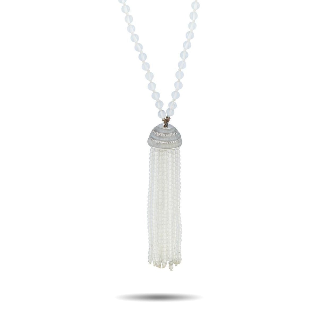 IVANKA TRUMP 18K WHITE GOLD DIAMOND AND CRYSTAL TASSEL NECKLACE: This Ivanka Trump necklace is a chic luxury piece that will continually make a statement. At the center of this pieces dramatic 38 chain, a tassel motif adds texture and movement to the overall design