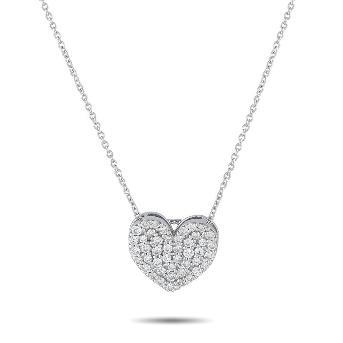 18K WHITE GOLD 0.54CT DIAMOND HEART NECKLACE: A sparkling heart-shaped pendant makes a statement at the center of this elegant necklace. Set in 18K White Gold, Diamonds totaling 0.54 carats make it simply stunning. The pendant measures 0.50 round
