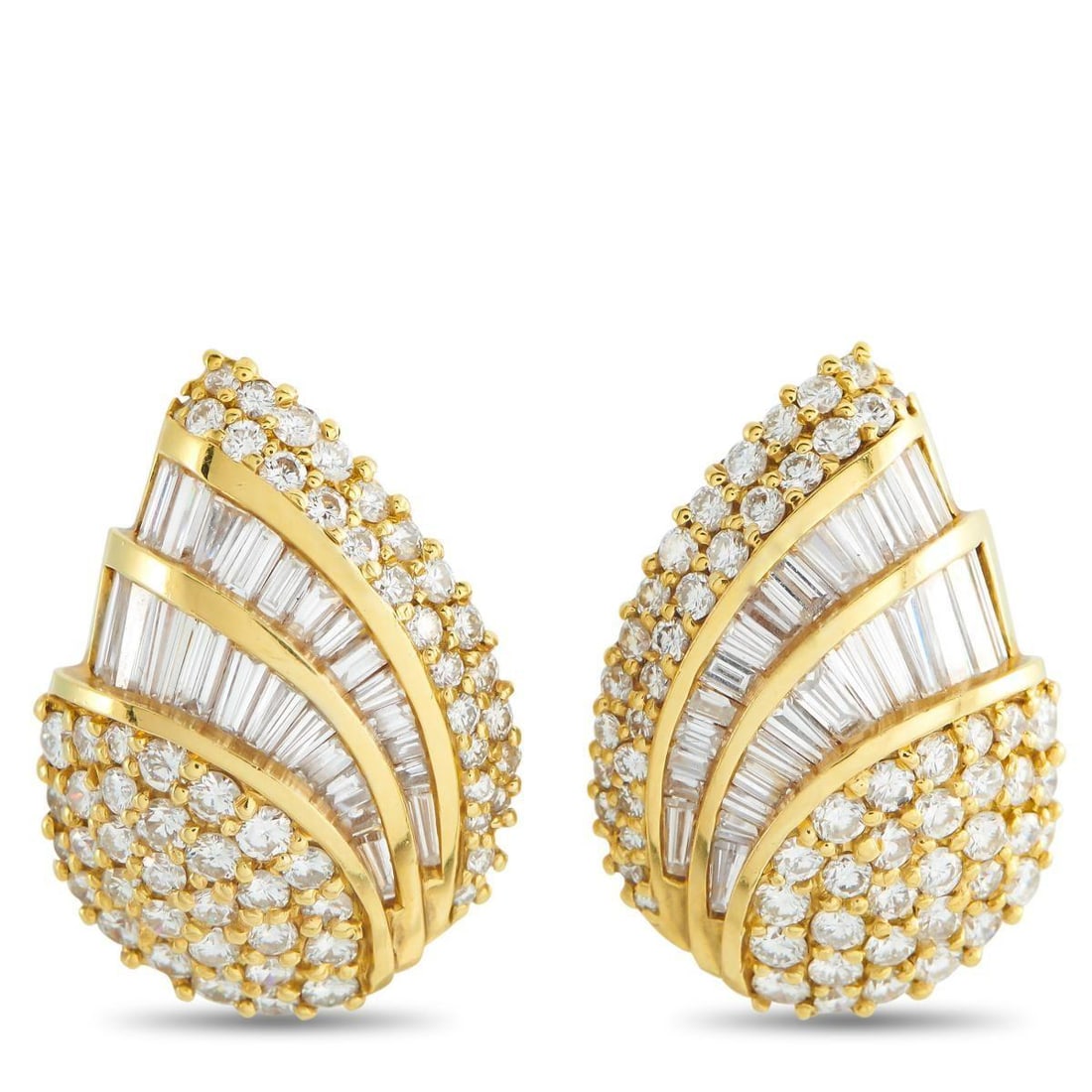 18K YELLOW GOLD 5.33CT DIAMOND CLIP-ON EARRINGS: Round-cut Diamonds and Diamond baguettes with a total weight of 5.33 carats make these earrings positively radiant. Crafted from 18K Yellow Gold, the dynamic setting adds extra visual impact to the st