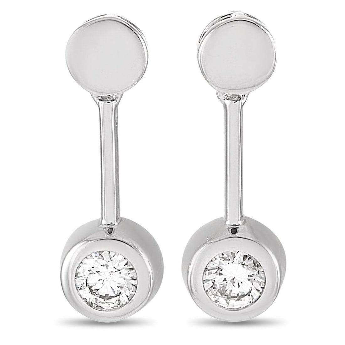 14K WHITE GOLD 0.58 CT DIAMOND EARRINGS: These earrings are crafted from 14K white gold and each of the two weighs 1.45 grams. They measure 0.63 in length and 0.19 in width. The pair is set with diamonds that total 0.58 carats.The earrings a