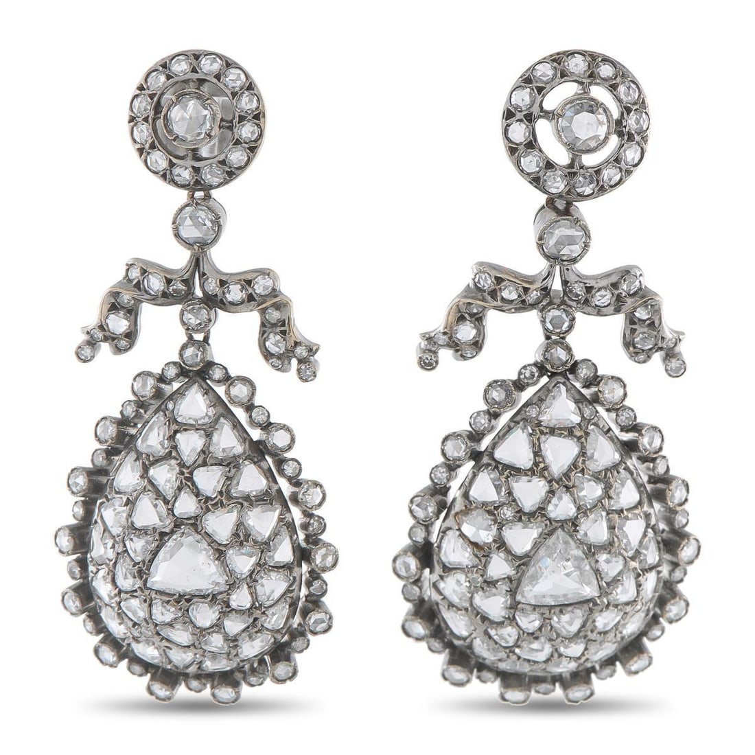 FRED LEIGHTON 18K WHITE GOLD 8.37CT DIAMOND EARRINGS: Incredibly ornate, these Fred Leighton earrings feature a classically elegant design that will continually captivate. Every dynamic detail is elevated by inset Diamonds totaling 8.37 carats. Set in 18