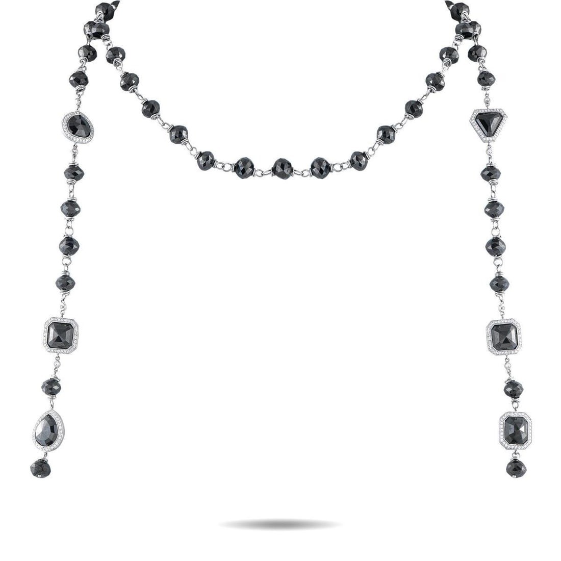 ERICA COURTNEY PLATINUM 120CT BLACK DIAMOND AND 2.0CT WHITE DIAMOND LARIAT NECKLACE: Dramatic in detail and rich in contrast, this lariat necklace by Erica Courtney showcases 120 carats of faceted black diamonds paired with 2.0 carats of brilliant white diamonds. Set in platinum, the 