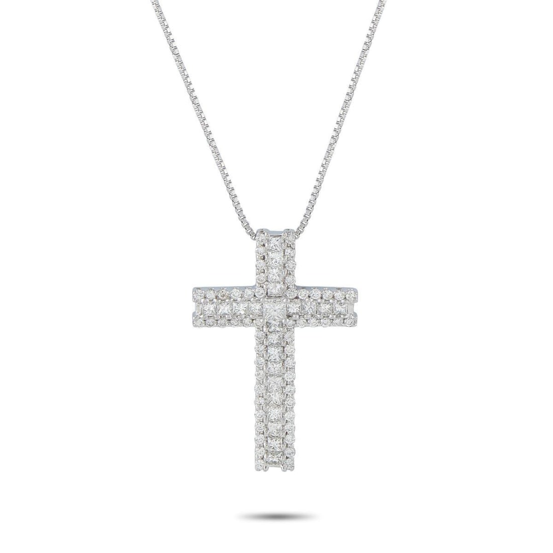 18K WHITE GOLD 1.75CT DIAMOND CROSS PENDANT NECKLACE: This necklace is a luxury piece that is meant to be passed through the generations. Set in 18K White Gold, the stunning cross pendant shines to life thanks to sparkling Diamonds totaling 1.75 carats. 