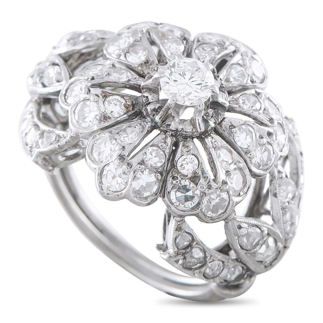 ANTIQUE 1.30CT PLATINUM DIAMOND RING: An intricate Platinum setting makes this antique ring a uniquely elegant piece that will continually impress. Inset Diamonds with a total weight of 1.30 carats allow it to continually catch the light 