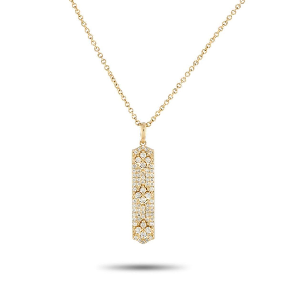 14K YELLOW GOLD 0.70CT DIAMOND PENDANT NECKLACE: Sparkling Diamonds totaling 0.70 carats make this 14K Yellow Gold necklace instantly eye-catching. The perfect piece for everyday wear, it features a detailed pendant measuring 1.38 long by 0.25 wide 