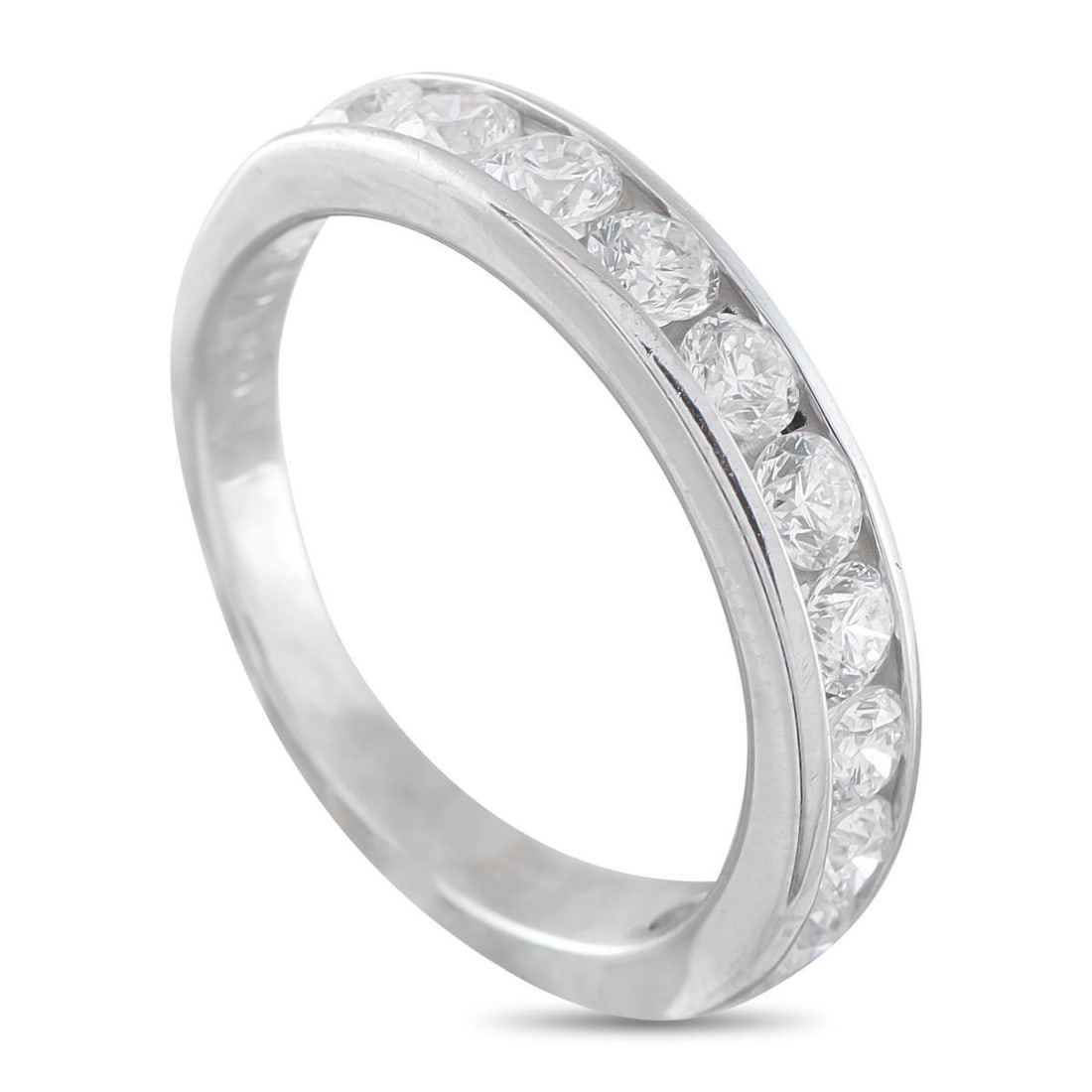 18K WHITE GOLD 1.0CT DIAMOND HALF-ETERNITY RING: A true classic. This refined and understated half-eternity ring is rendered in 18K white gold and set with 1 carat total weight of round diamonds in a channel. Each stone sits flush, creating a smooth