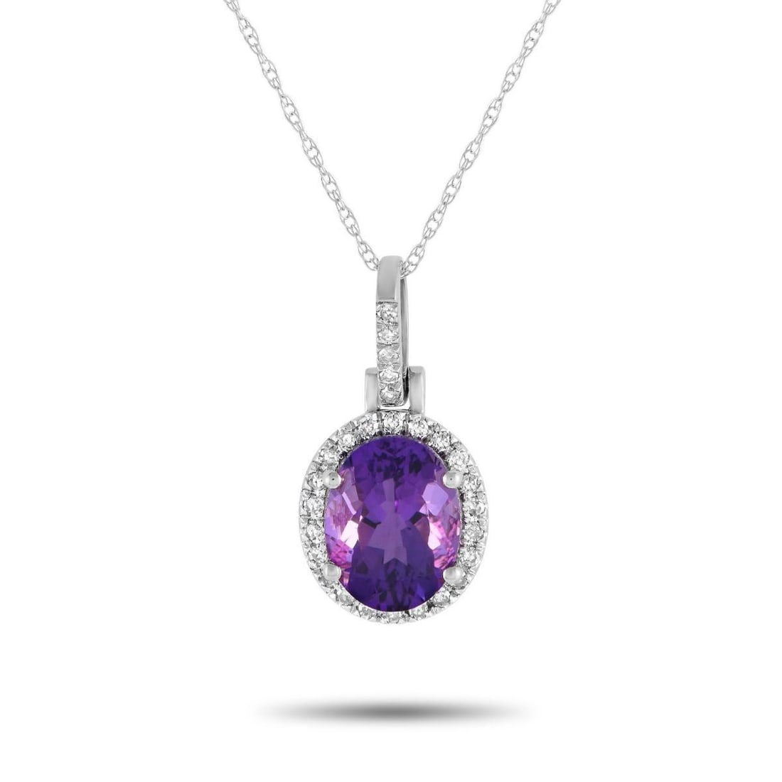 14K WHITE GOLD 0.13CT DIAMOND AND AMETHYST PENDANT NECKLACE: Add elegance to any ensemble with this impeccably crafted necklace. Crafted from 14K White Gold, this piece features a stunning Amethyst center stone and Diamond accents with a total weight of 0.13 ca