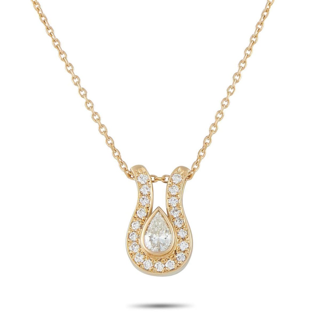 18K YELLOW GOLD 0.90CT DIAMOND NECKLACE: This luxury necklace will instantly elevate any ensemble. Understated enough for everyday wear, this pieces pendant shines to life thanks to a 0.65 carat Diamond center stone and additional Diamond ac