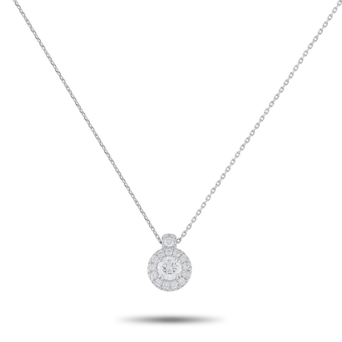 PLATINUM 0.71CT DIAMOND PENDANT NECKLACE: This scintillating necklace is meant to continually catch the light. Crafted from Platinum, this piece comes to life thanks to a 0.31 carat Diamond center stone and Diamond accents totaling 0.40 carat