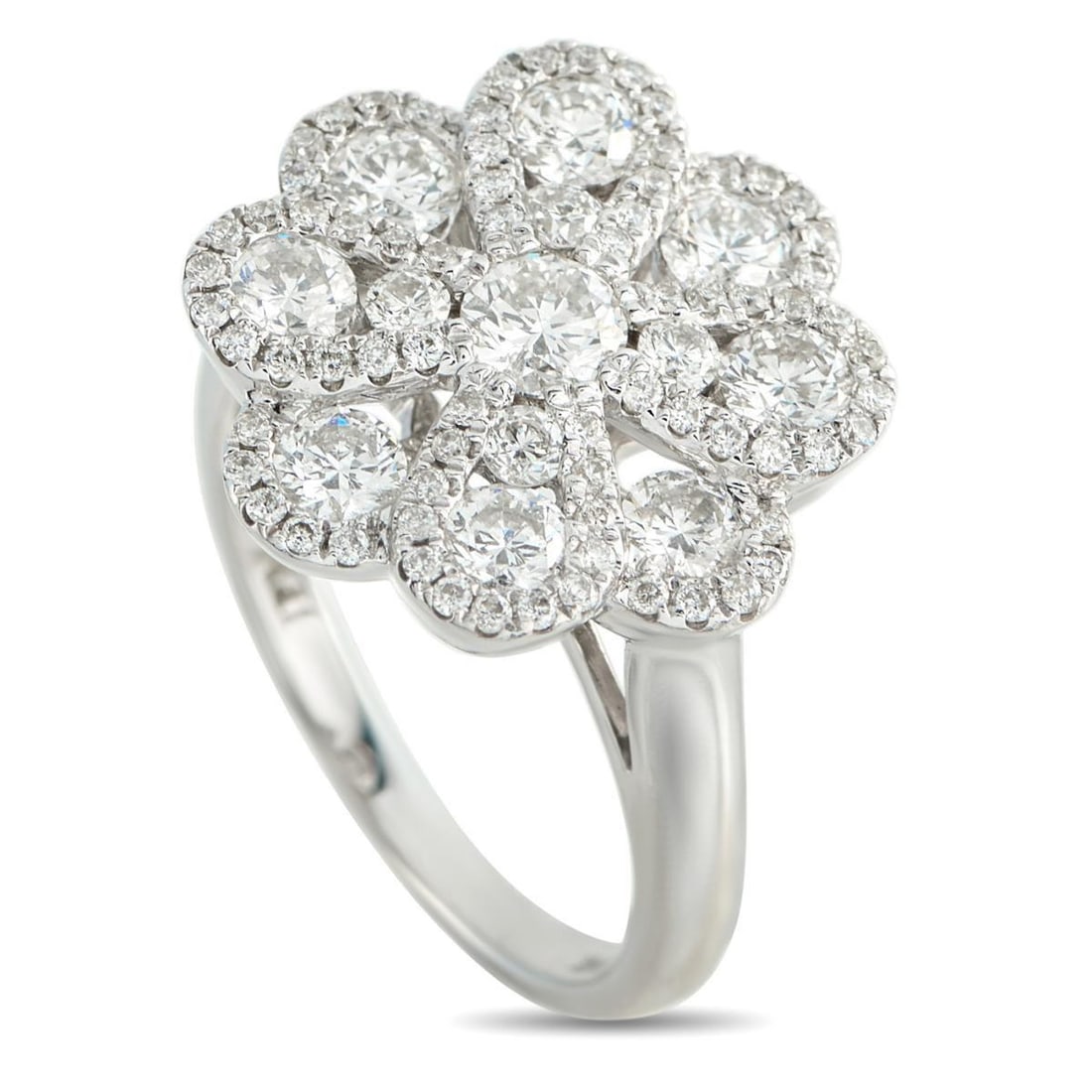14K WHITE GOLD 1.89CT DIAMOND RING: This ring features a floral centerpiece built in layers. Starting from a slender 2mm white gold band, a round center diamond is framed by four petals, each set with two round diamonds of differing siz
