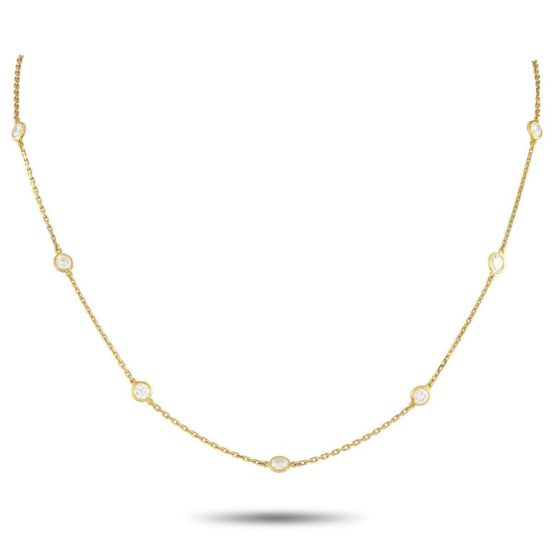 TIFFANY & CO. ELSA PERETTI DIAMONDS BY THE YARD 18K YELLOW GOLD 2.50CT DIAMOND NECKLACE: From Tiffany's Diamonds by the Yard collection, this necklace designed by Elsa Peretti features an 18K yellow gold cable chain punctuated by bezel-set round brilliant diamonds totaling 2.50 carats. Th