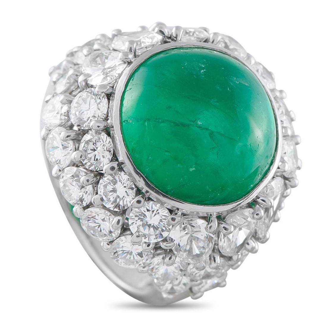 PLATINUM 5.30CT DIAMOND AND COLOMBIAN EMERALD RING: With a rich focal point, this ring stands out in any setting. A 7.52 carat intense green Colombian emerald commands the center, cut en cabochon and secured in a bezel. A surround of colorless diamonds