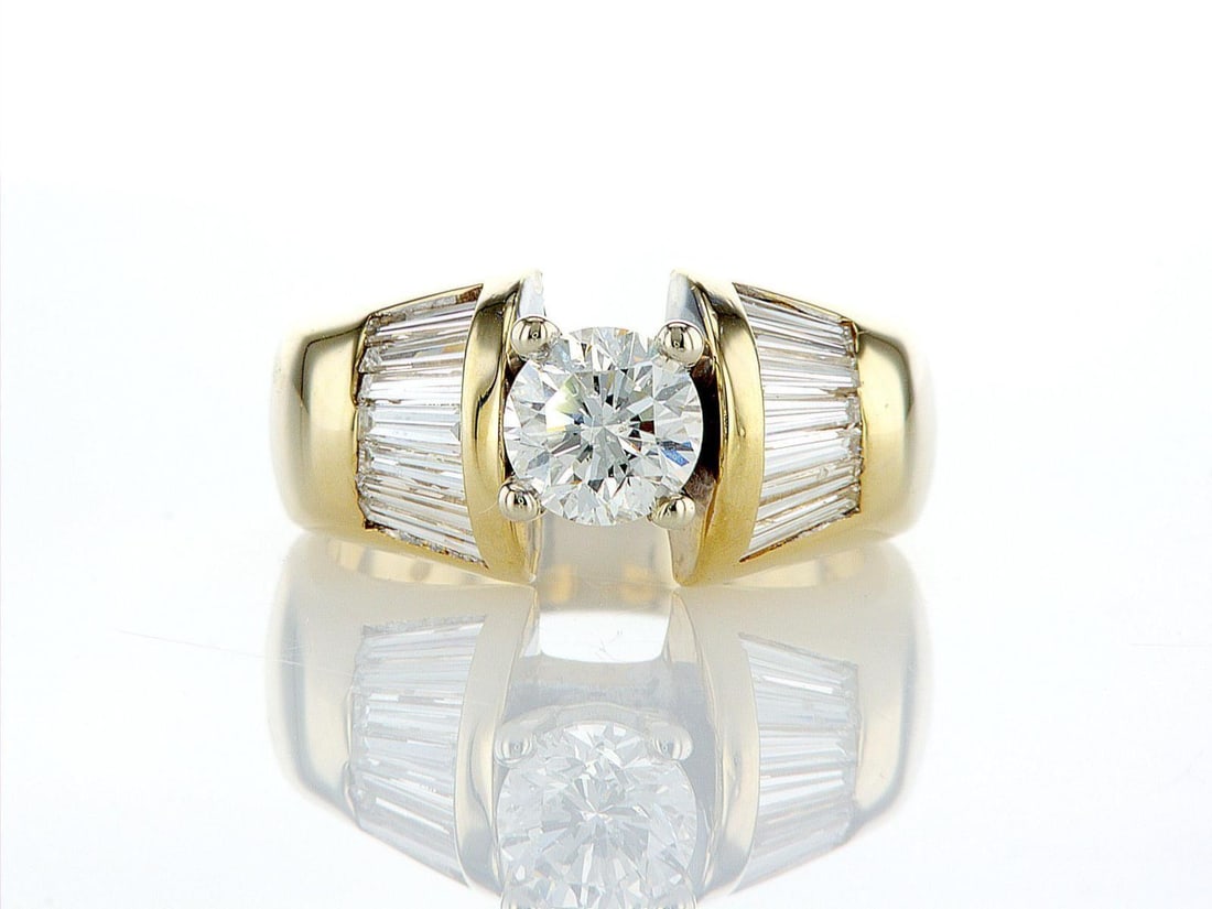 14kt Yellow Gold 1.86ctw Diamond Ring: One 14k yellow gold ring set with one center natural diamond and 14 natural diamonds around on the sides. Jewelry Weight: 8.72Grs Total Diamonds Weight: 1.86Cts Main Stones Description: Quantity: 1 Cu