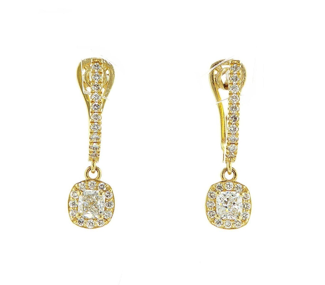 14kt Yellow Gold 1.34ctw Diamond Earrings: One 14k yellow gold earring, set with natural diamonds Jewelry Weight: 4.63Grs Total Diamonds Weight: 1.34Cts Main Stones Description: Quantity: 2 Cut and shape: Cushion Carats Weight: 0.9 Clarity: VS