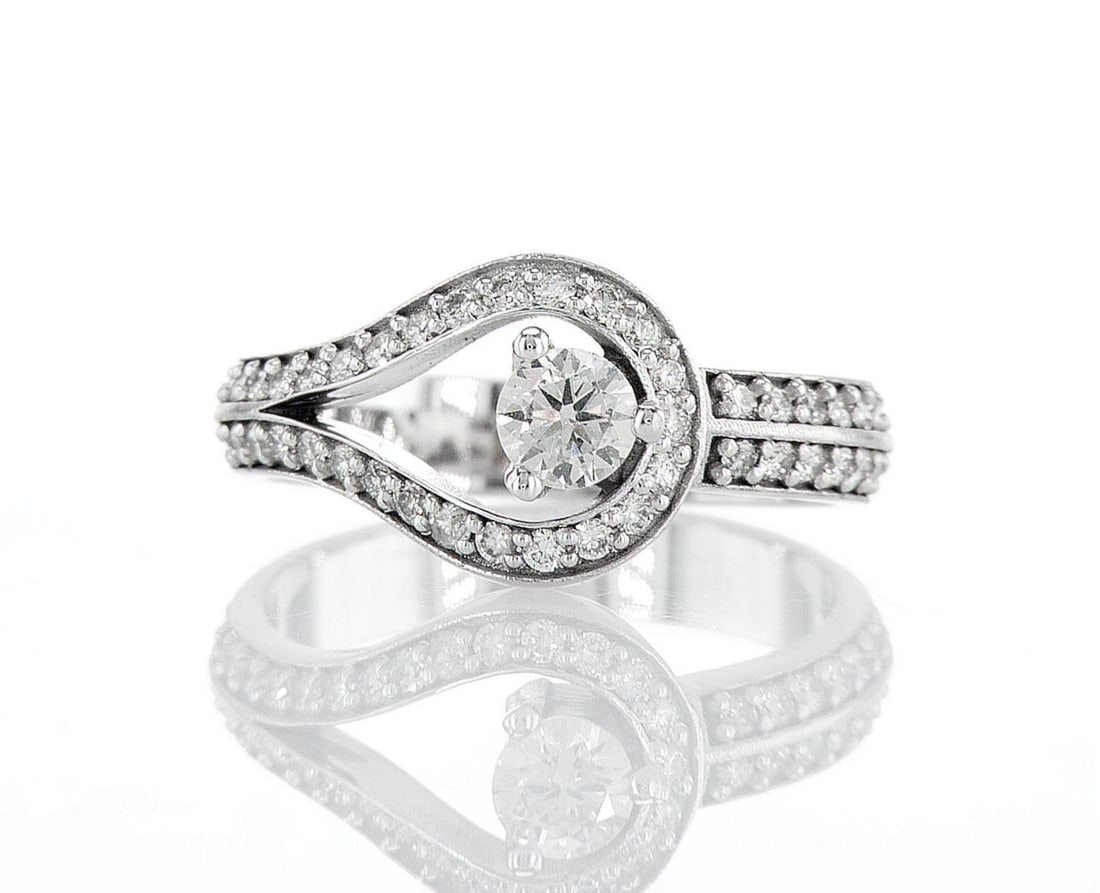 14kt White Gold 0.8ctw Diamond Ring: Jewelry Description Description: One 14k white gold ring, set with natural diamonds. Jewelry Weight: 4.24 Grs Total Diamonds Weight: 0.8 Cts Precious Metal: 14kt White Gold Certificate Number: DSL- 44