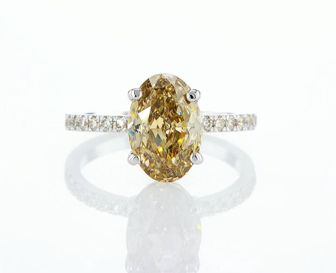 14kt White Gold 3.25ctw Diamond Ring: One 14k white gold ring (14k stamped), set with one center natural diamond and small natural diamonds on the sides. Jewelry Weight: 3.17Grs Total Diamonds Weight: 3.25Cts Main Stones Description: Quan