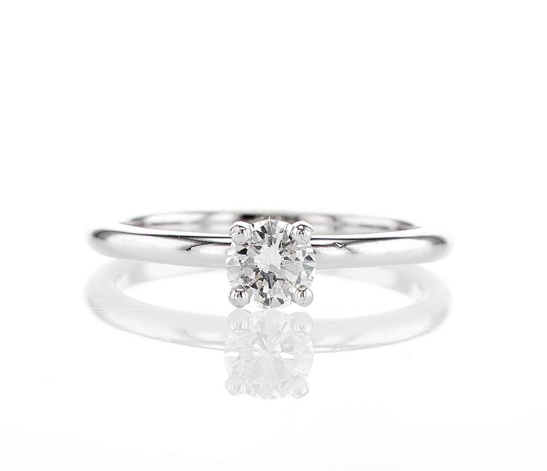 14K White Gold 0.33ctw Diamond Ring: Jewelry Description Description: One 14K white gold ring, set with natural diamond. Jewelry Weight: 2.14 Grs Total Diamonds Weight: 0.33 Cts Precious Metal: 14K White Gold Certificate Number: Assessme
