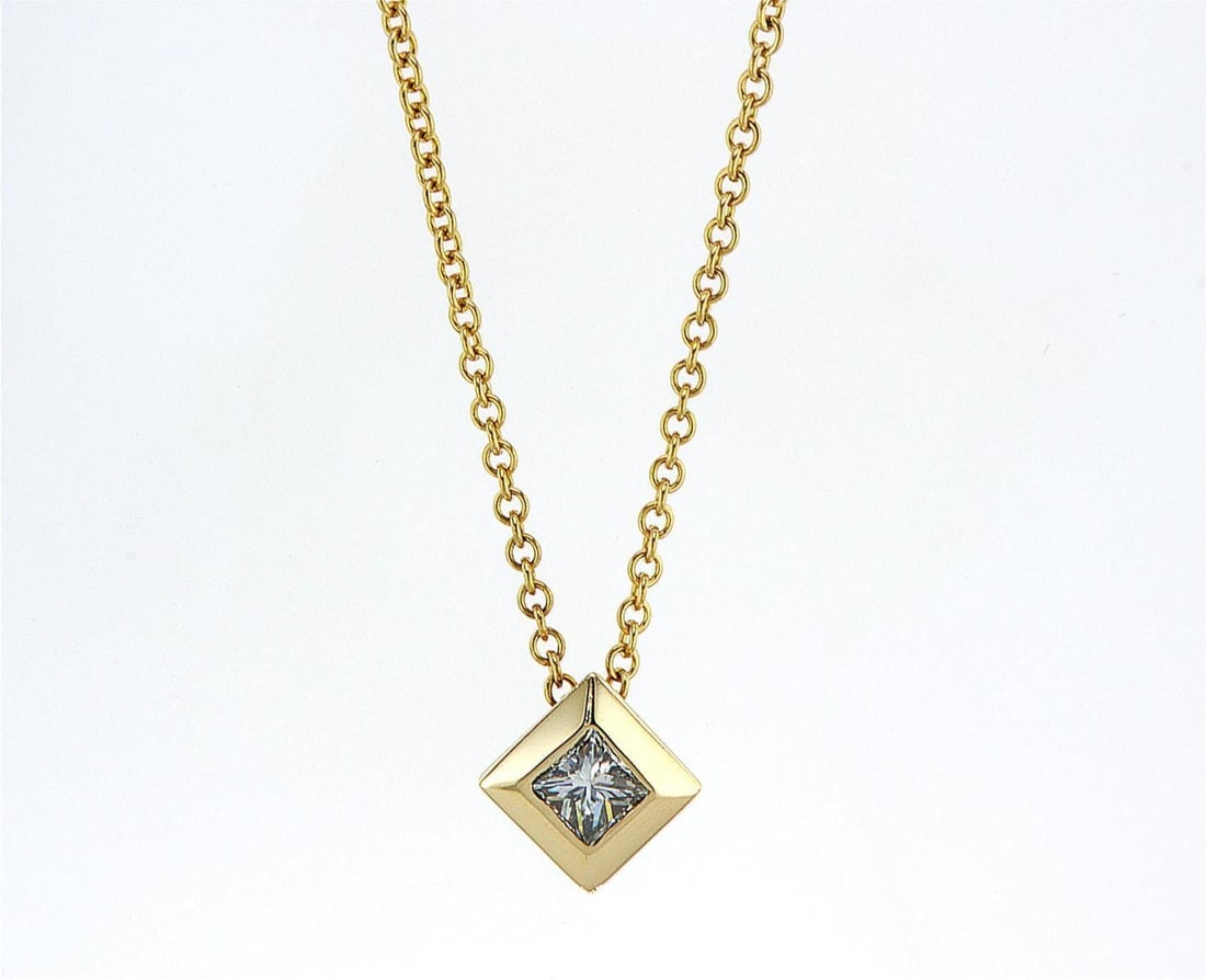 14kt Yellow Gold 0.45ctw Diamond Pendant: One 14k yellow gold pendant with chain (14k stamped), set with one center natural diamond. Jewelry Weight: 4.1Grs Total Diamonds Weight: 0.45Cts Main Stones Description: Quantity: 1 Cut and shape: Pri