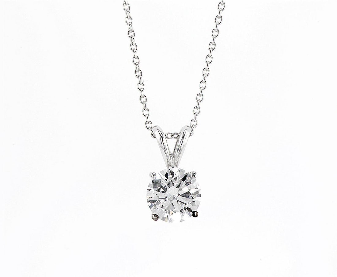 14kt White Gold 1.53ctw Diamond Pendant: One 14k white gold pendant with chain, set with one center lab grown diamond Jewelry Weight: 2.44Grs Total Diamonds Weight: 1.53Cts Main Stones Description: Quantity: 1 Cut and shape: Round Brilliant 