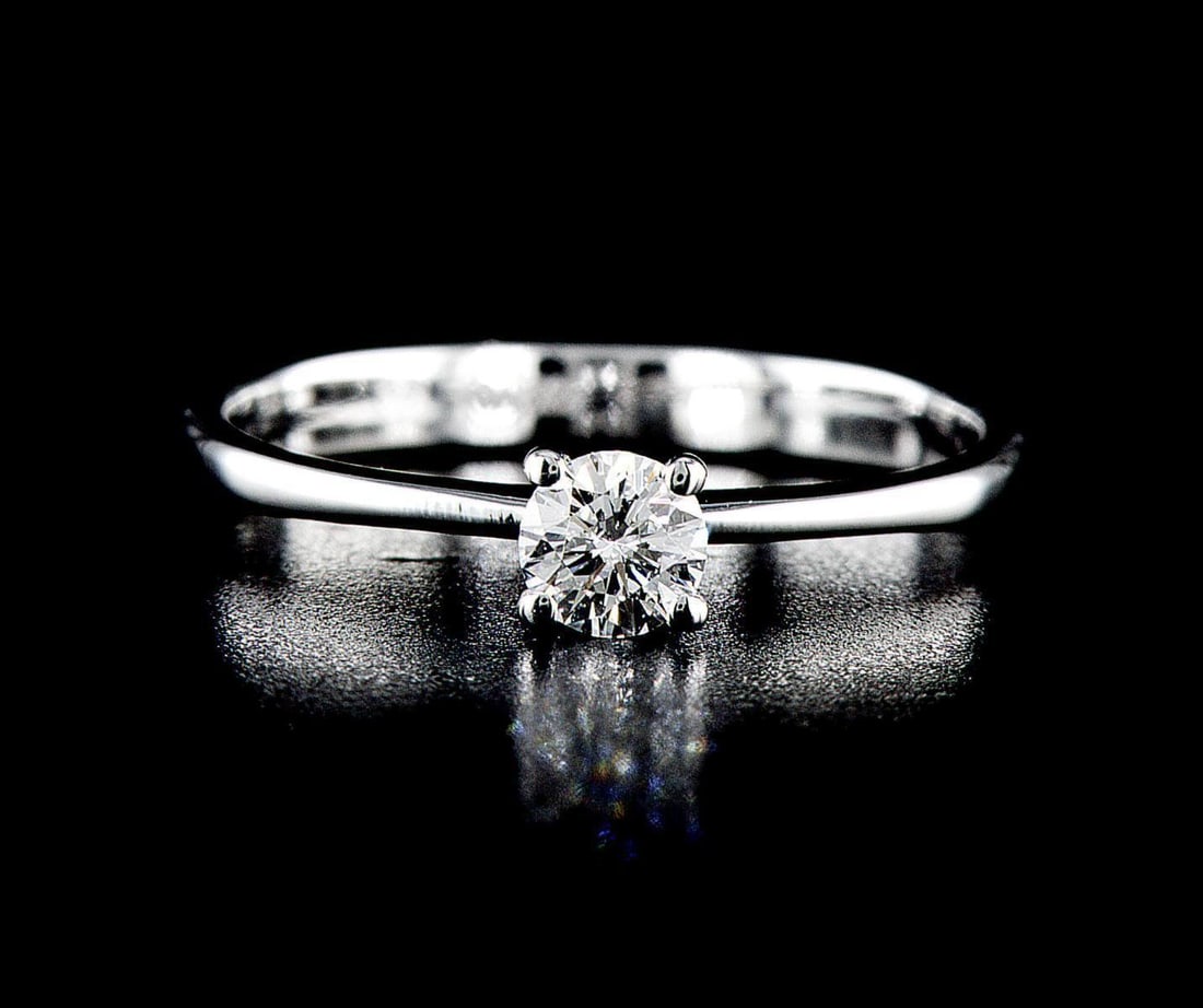 14kt White Gold 0.32ctw Diamond Ring: One 14k white gold ring Jewelry Weight: Grs Total Diamonds Weight: 0.32Cts Main Stones Description: Quantity: 1 Cut and shape: Round Brilliant Carats Weight: 0.32 Clarity: SI1 Color: E Polish/Symmetry