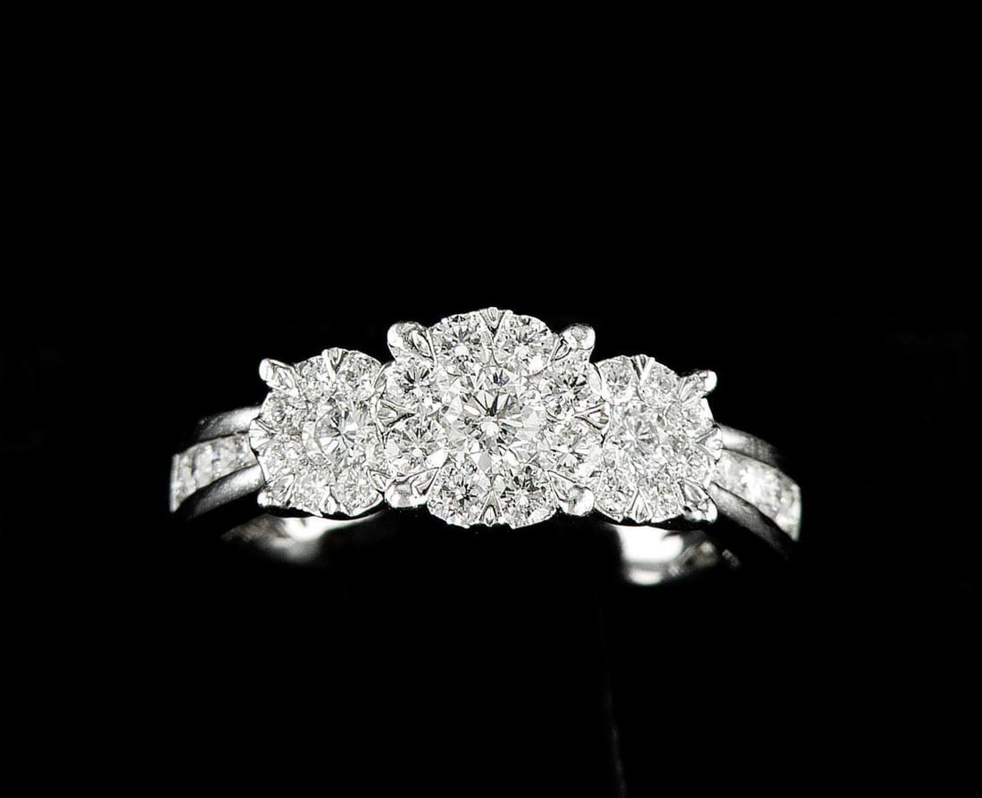 14kt White Gold 1.25ctw Diamond Ring: One 14k white gold ring (14k stamped), set with natural diamonds. Jewelry Weight: 4.62Grs Total Diamonds Weight: 1.25Cts Main Stones Description: Cut and shape: Round Brilliant Carats Weight: 1.25 Cla