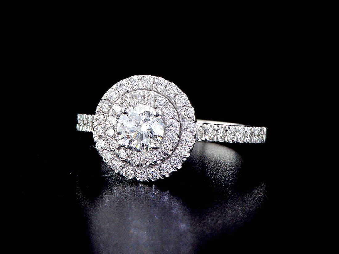 14kt White Gold 1.56ctw Diamond Ring: Jewelry Description Description: One 14K white gold ring (14K stamped), set with one center natural diamond and small natural diamonds around and on the sides. Jewelry Weight: 2.85 Grs Total Diamonds 