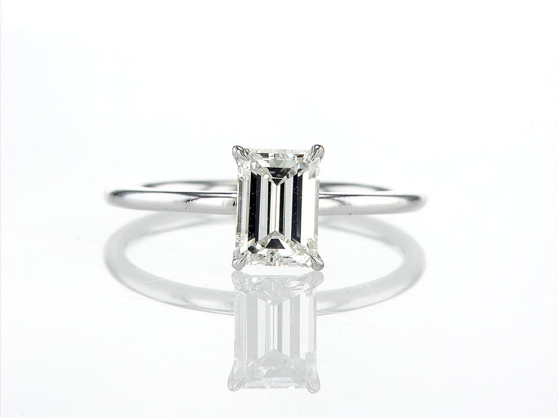 14kt White Gold 1ctw Diamond Ring: One 14k white gold ring, set with one center natural diamond. Jewelry Weight: 1.89Grs Total Diamonds Weight: 1Cts Main Stones Description: Quantity: 1 Cut and shape: Baguette Carats Weight: 1 Clarity: