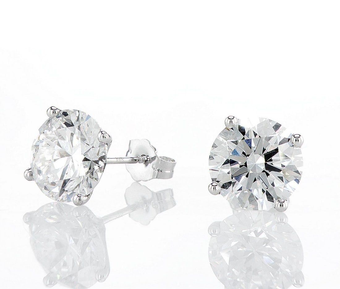 14kt White Gold 6.08ctw Diamond Earrings: Jewelry Description Description: One pair of 14k white gold earrings, set with lab grown diamonds. Jewelry Weight: 2.25 Grs Total Diamonds Weight: 6.08 Cts Precious Metal: 14kt White Gold Certificate 
