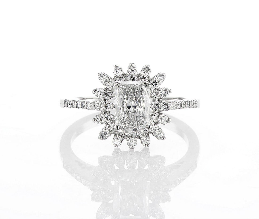 14kt White Gold 1.48ctw Diamond Ring: One 14k white gold ring, set with lab grown diamond. Jewelry Weight: 3.46Grs Total Diamonds Weight: 1.48Cts Main Stones Description: Quantity: 1 Cut and shape: Radiant Carats Weight: 1.02 Clarity: VS1