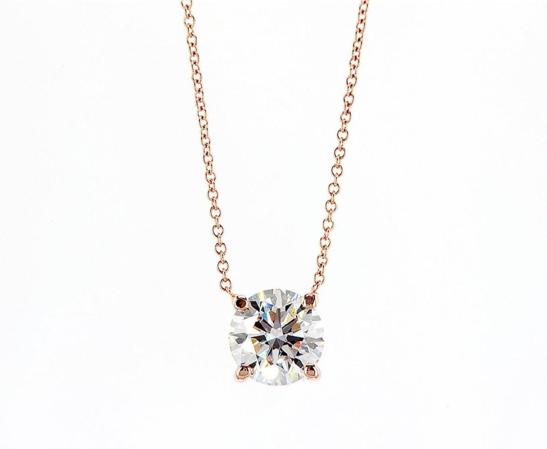 14kt Rose Gold 2.01ctw Diamond Pendant: One 14k rose gold pendant with chain, set with one center lab grown diamond. Jewelry Weight: 2.46Grs Total Diamonds Weight: 2.01Cts Main Stones Description: Quantity: 1 Cut and shape: Round Brilliant 