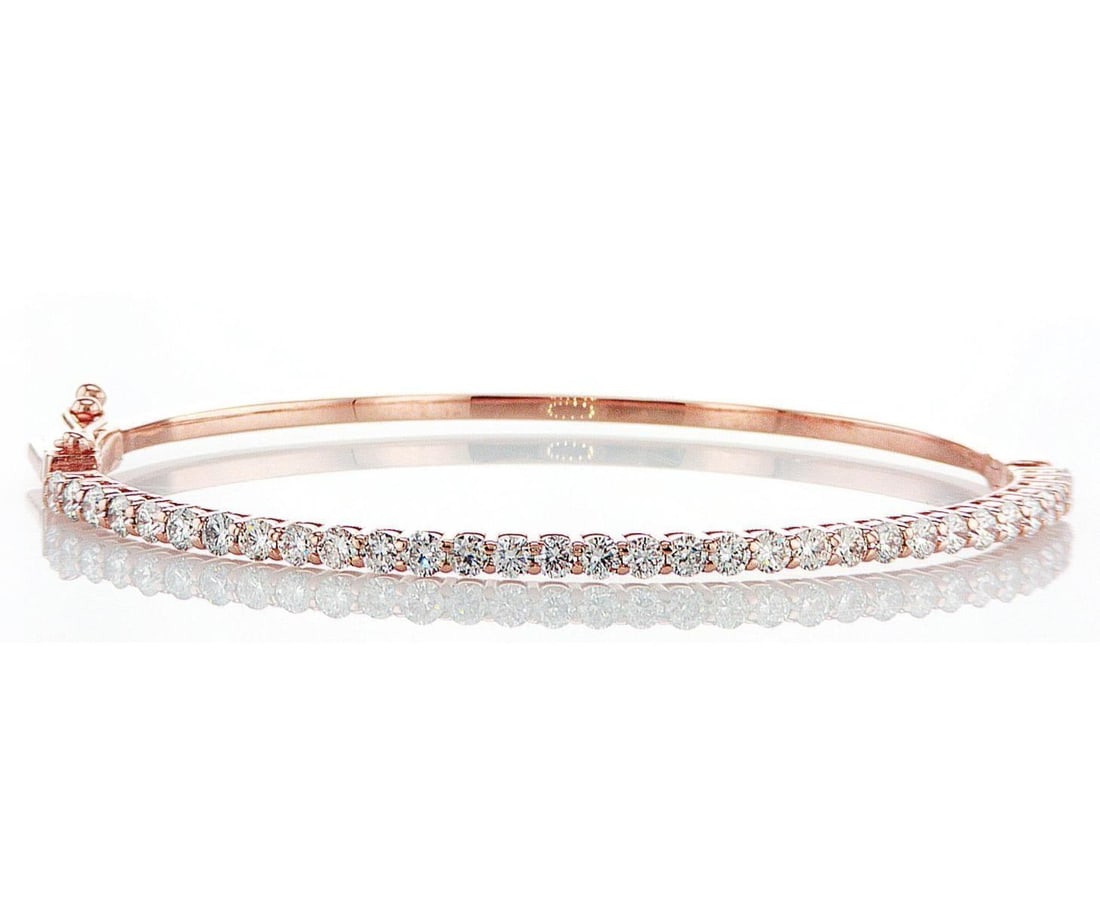 14kt Rose Gold 1.9ctw Diamond Bracelet: One 14k rose gold bracelet, set with lab grown diamonds. Jewelry Weight: 9.24Grs Total Diamonds Weight: 1.9Cts Main Stones Description: Quantity: 32 Cut and shape: Round Brilliant Carats Weight: 1.9 C