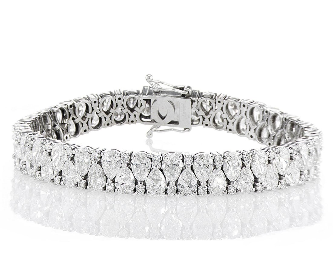14kt White Gold 23.71ctw Diamond Bracelet: Jewelry Description Description: One 14k white gold bracelet, set with lab grown diamonds. Jewelry Weight: 29.51 Grs Total Diamonds Weight: 23.71 Cts Precious Metal: 14kt White Gold Certificate Number