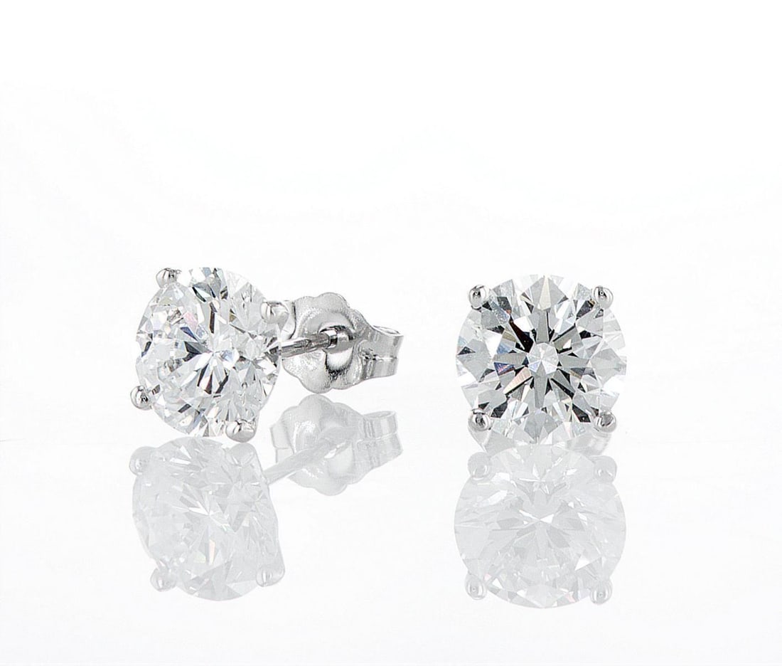 14kt White Gold 3.1ctw Diamond Earrings: Jewelry Description Description: One pair of 14k white gold earrings, set with lab grown diamonds. Jewelry Weight: 1.28 Grs Total Diamonds Weight: 3.1 Cts Precious Metal: 14kt White Gold Certificate N