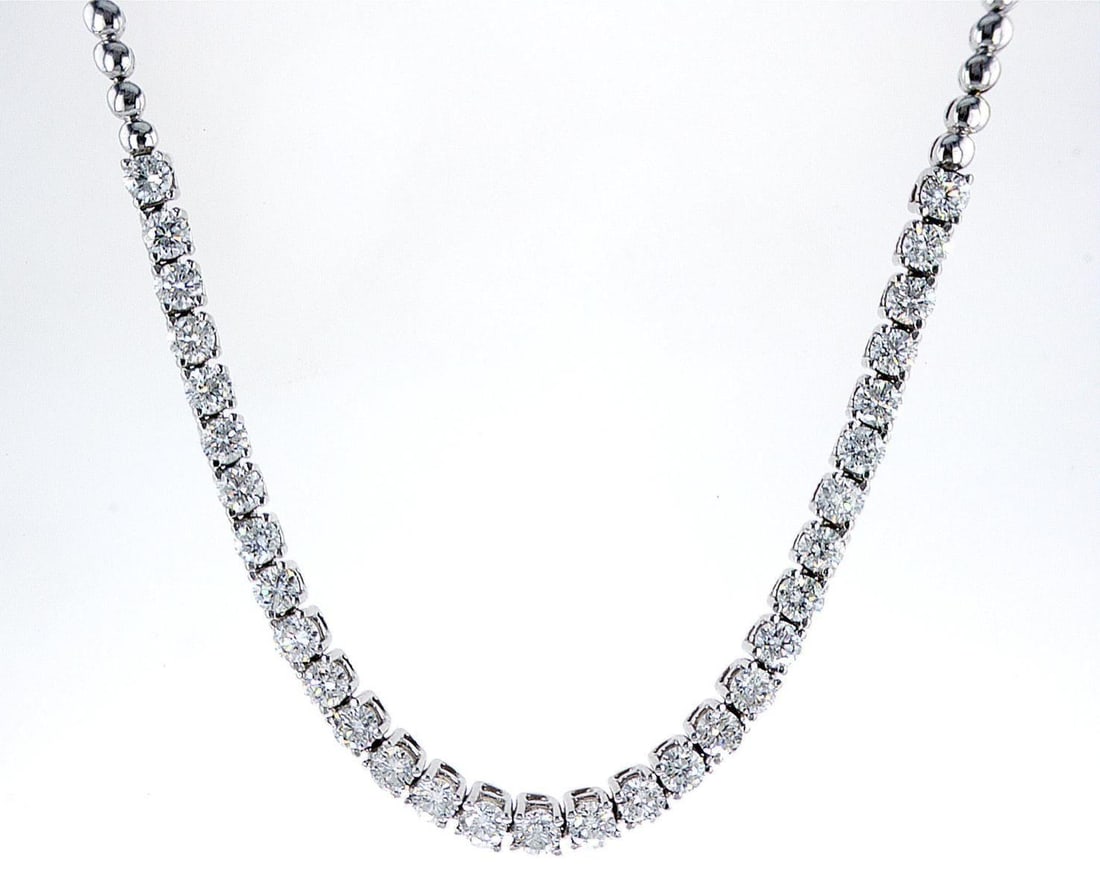 14kt White Gold 4.95ctw Diamond Necklace: One 14k white gold necklace (14k stamped), set with 31 natural diamonds. Jewelry Weight: 25.73Grs Total Diamonds Weight: 4.95Cts Main Stones Description: Quantity: 31 Cut and shape: Round Brilliant Ca