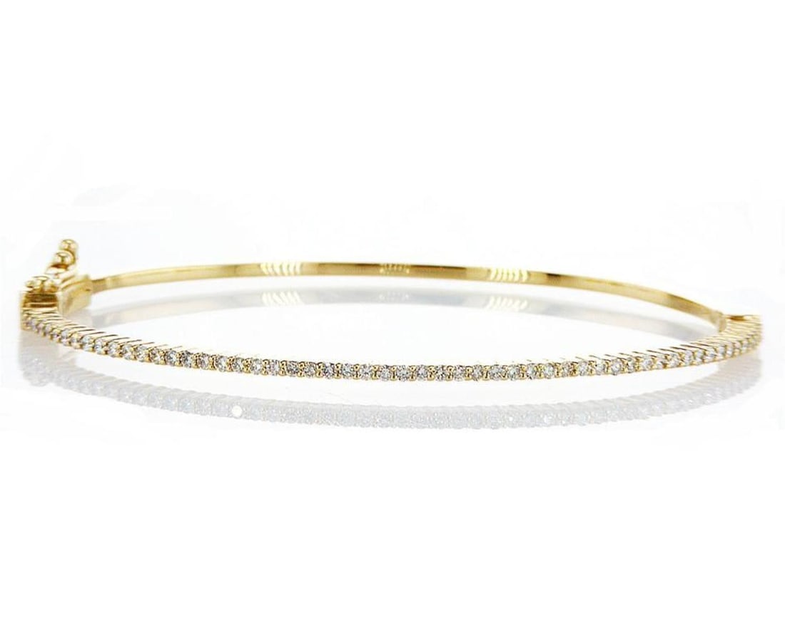 14kt Yellow Gold 0.68ctw Diamond Bangle: Jewelry Description Description: One 14k yellow gold bangle, set with natural diamonds. Jewelry Weight: 7.99 Grs Total Diamonds Weight: 0.68 Cts Precious Metal: 14kt Yellow Gold Certificate Number: DS