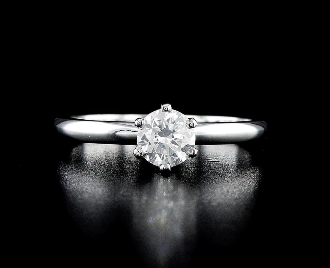 14kt White Gold 0.71ctw Diamond Ring: One 14k white gold ring (14k stamped), set with one center natural diamond. Jewelry Weight: 2.98Grs Total Diamonds Weight: 0.71Cts Main Stones Description: Quantity: 1 Cut and shape: Round Brilliant C