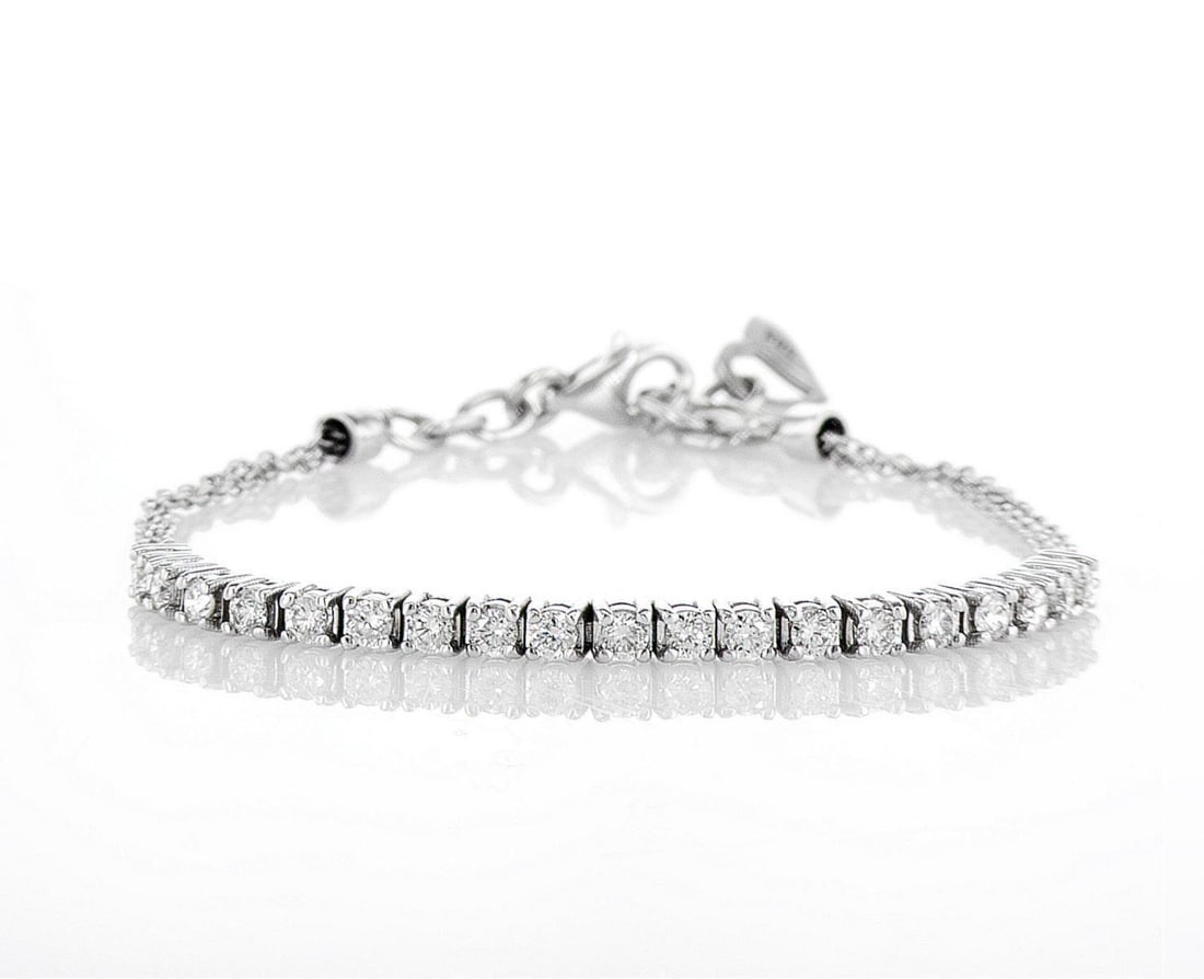 14kt White Gold 0.68ctw Diamond Bracelet: Jewelry Description Description: One 14k white gold bracelet, set with natural diamonds. Jewelry Weight: 4.05 Grs Total Diamonds Weight: 0.68 Cts Precious Metal: 14kt White Gold Certificate Number: DS