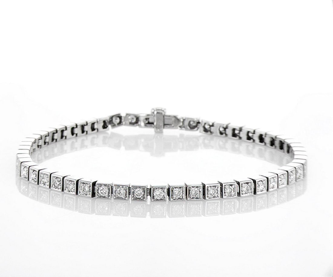 14kt White Gold 1.06ctw Diamond Bracelet: Jewelry Description Description: One 14k white gold bracelet, set with natural diamonds. Jewelry Weight: 8.45 Grs Total Diamonds Weight: 1.06 Cts Precious Metal: 14kt White Gold Certificate Number: DS
