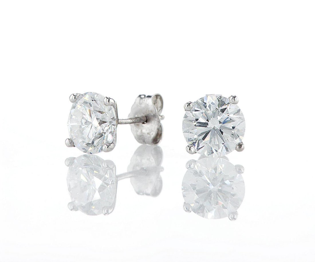 14kt White Gold 3.02ctw Diamond Earrings: Jewelry Description Description: One pair of 14k white gold earrings, set with lab grown diamonds. Jewelry Weight: 1.38 Grs Total Diamonds Weight: 3.02 Cts Precious Metal: 14kt White Gold Certificate 