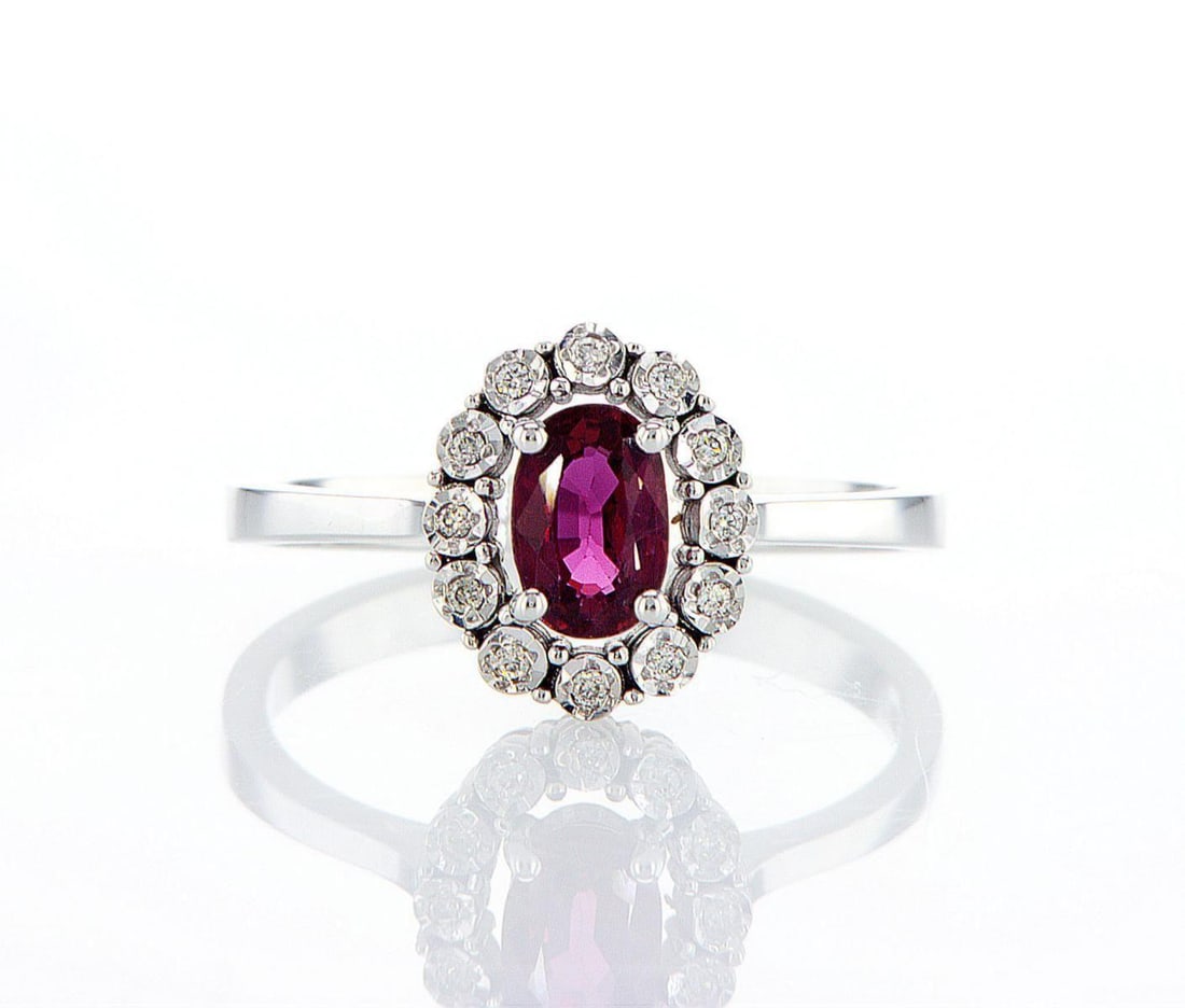14kt White Gold 0.12ctw Diamond Ring: Jewelry Description Description: One 14k white gold ring, set with a ruby stone and natural diamonds. Jewelry Weight: 2.65 Grs Total Diamonds Weight: 0.12 Cts Precious Metal: 14kt White Gold Certifica