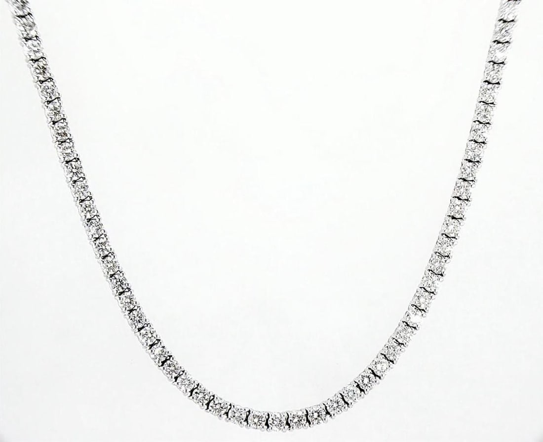 14kt White Gold 15.27ctw Diamond Collar: One 19.09 gr. 14kt White Gold Diamond Collar Jewelry Weight: 19.09Grs Total Diamonds Weight: 15.27Cts Main Stones Description: Quantity: 145 Cut and shape: Round Brilliant Carats Weight: 15.27