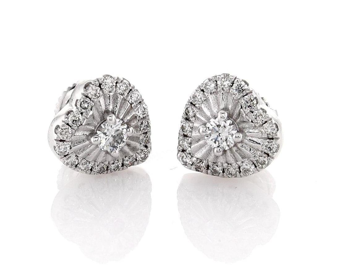14kt White Gold 0.57ctw Diamond Earrings: Jewelry Description Description: One 14k white gold earrings, set with natural diamonds. Jewelry Weight: 2.34 Grs Total Diamonds Weight: 0.57 Cts Precious Metal: 14kt White Gold Certificate Number: