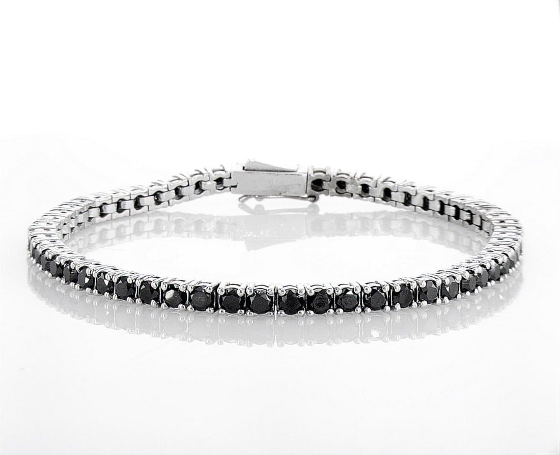 14kt White Gold 6.38ctw Diamond Bracelet: Jewelry Description Description: One 14k white gold bracelet, set with natural diamonds. Jewelry Weight: 12.62 Grs Total Diamonds Weight: 6.38 Cts Precious Metal: 14kt White Gold Certificate Number: