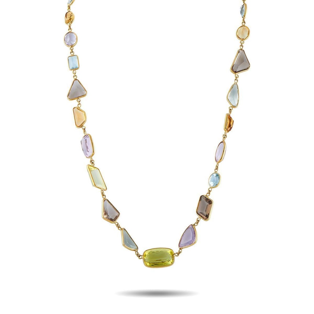 H. STERN 18K YELLOW GOLD MULTICOLORED GEMSTONE NECKLACE: An array of translucent gemstones gives this H. Stern necklace a distinct sense of style. Set in 18K Yellow Gold, it measures 20 long and will add a bold pop of color to any ensemble.This jewelry piec