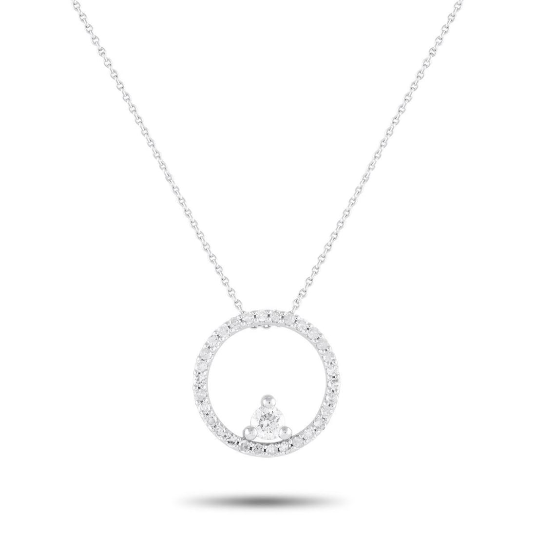 14K WHITE GOLD 0.25CT DIAMOND NECKLACE: Geometric forms and luxurious materials make this necklace a timeless piece that will never go out of style. The circular pendant measures 0.5 round and comes to life thanks to dazzling Diamonds with 