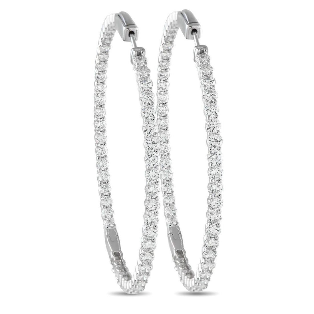 18K WHITE GOLD 7.20CT DIAMOND INSIDE-OUT HOOP EARRINGS: These slim diamond hoops measure 2 x 2.15 inches, offering a refined presence with just the right hint of drama. Designed in-and-out style, they feature 7.20 carats of diamonds sparkling across both